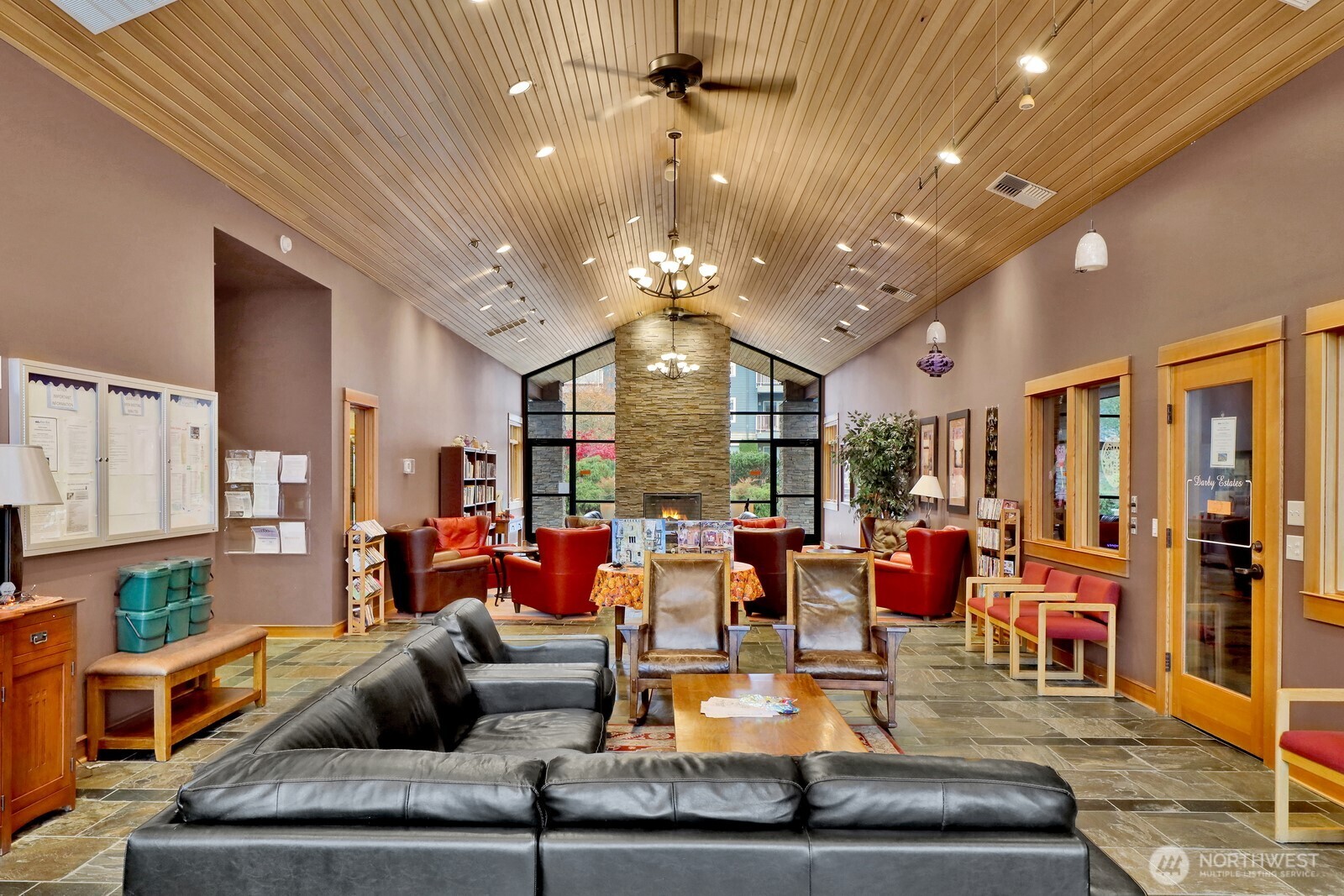 516 Darby Drive, Unit 104 Bellingham, WA 98226 - Photo 33 of 40 a living room with fireplace furniture and a large window