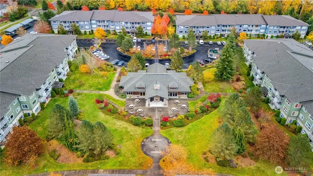 an aerial view of swimming pool patio and mountain view