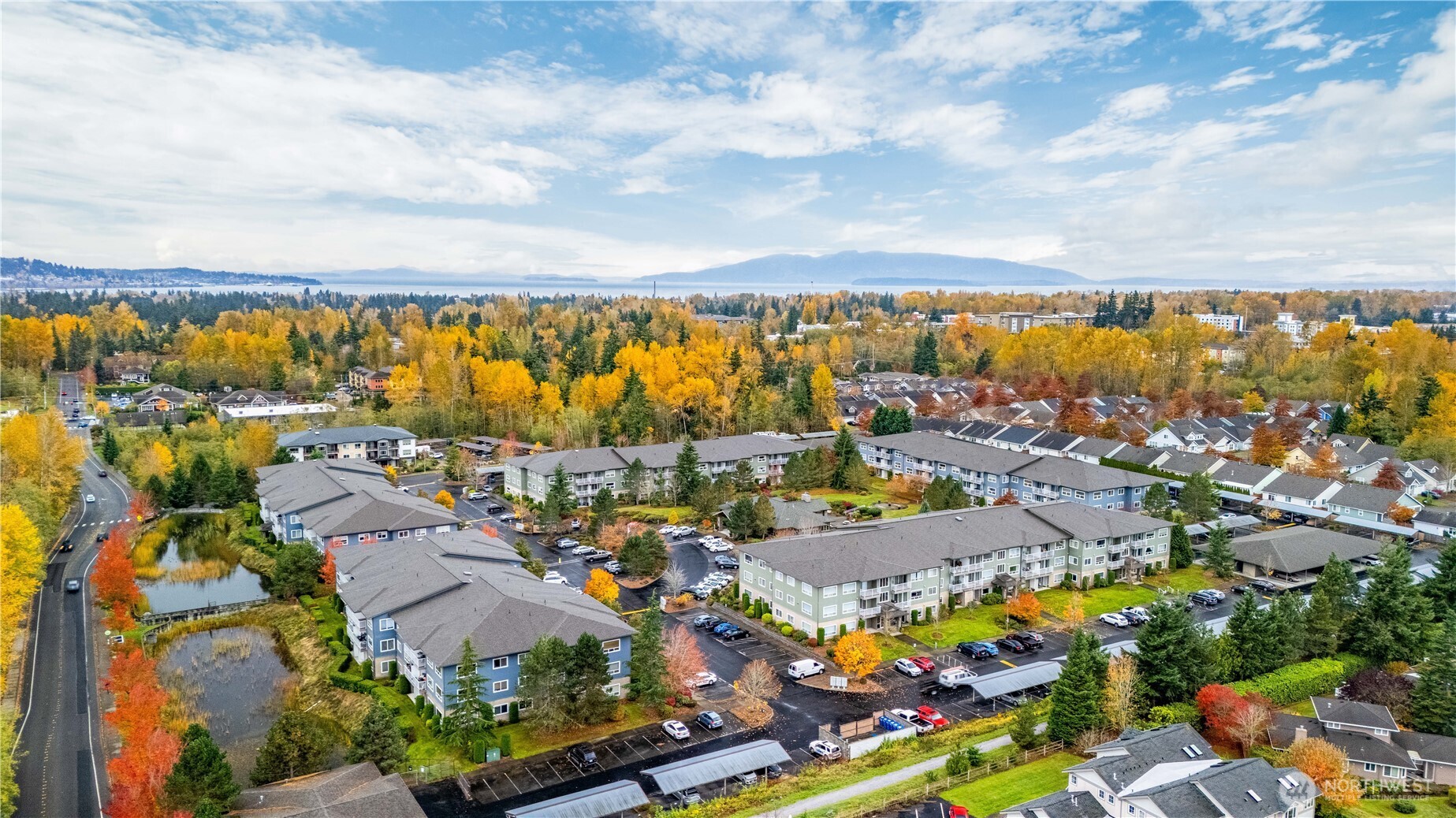 516 Darby Drive, Unit 104 Bellingham, WA 98226 - Photo 40 of 40 an aerial view of swimming pool patio and mountain view