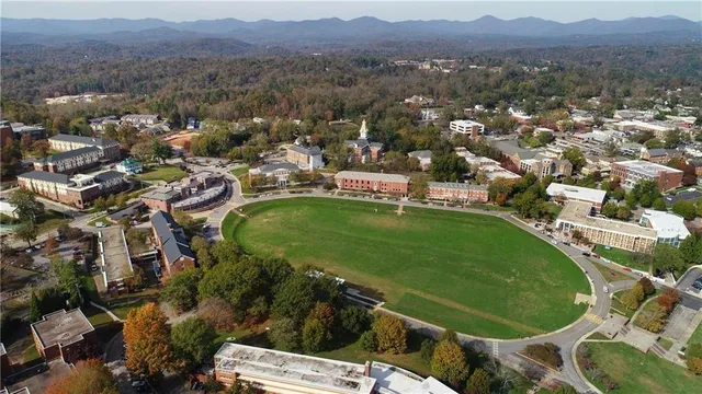 an aerial view of a city with lots of residential buildings