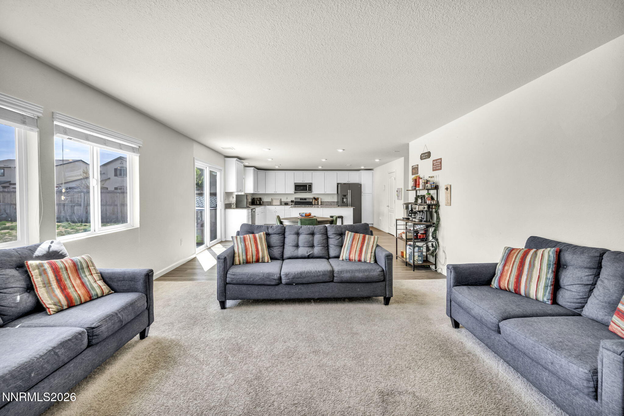 8982 Wolf River Drive Reno, NV 89506 - Photo 16 of 65 a living room with furniture and hard wood flooring