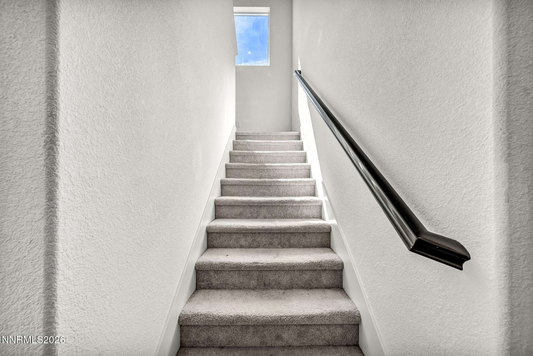 8982 Wolf River Drive Reno, NV 89506 - Photo 24 of 65 a view of staircase with white walls