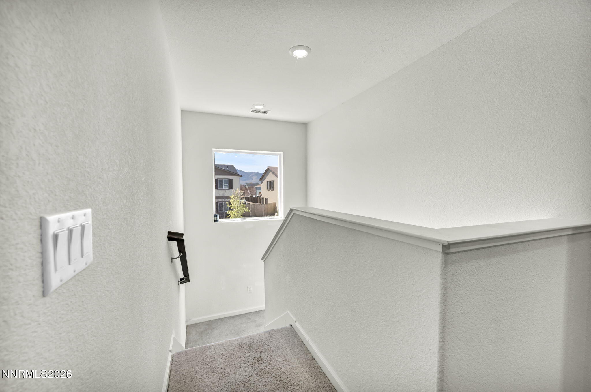 8982 Wolf River Drive Reno, NV 89506 - Photo 25 of 65 a view of a hallway with closet