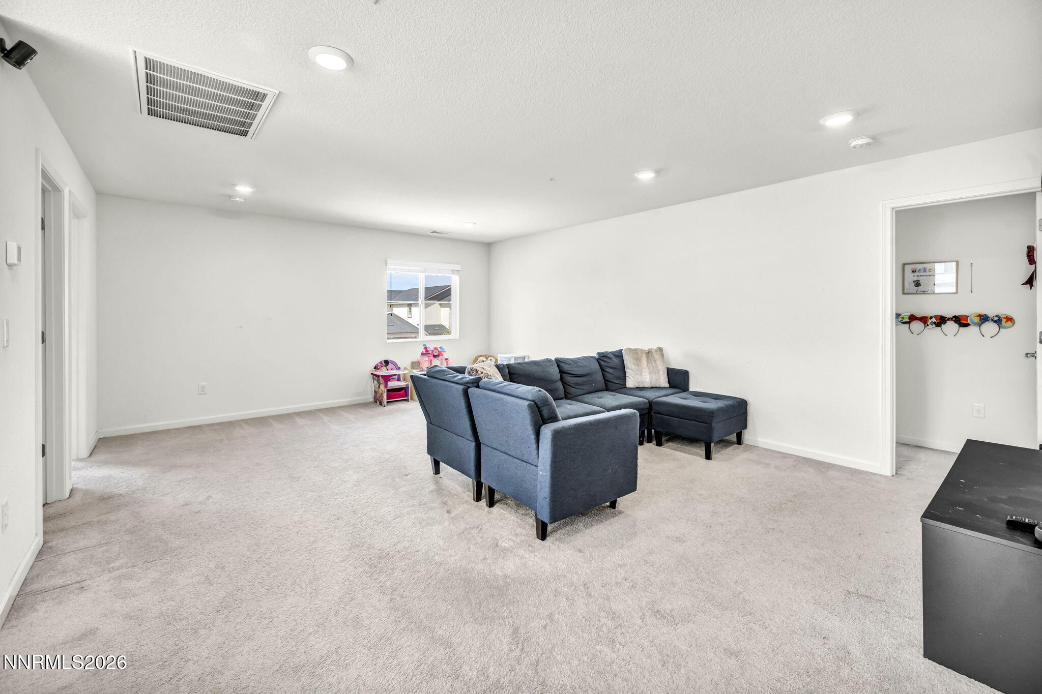 8982 Wolf River Drive Reno, NV 89506 - Photo 26 of 65 a living room with furniture