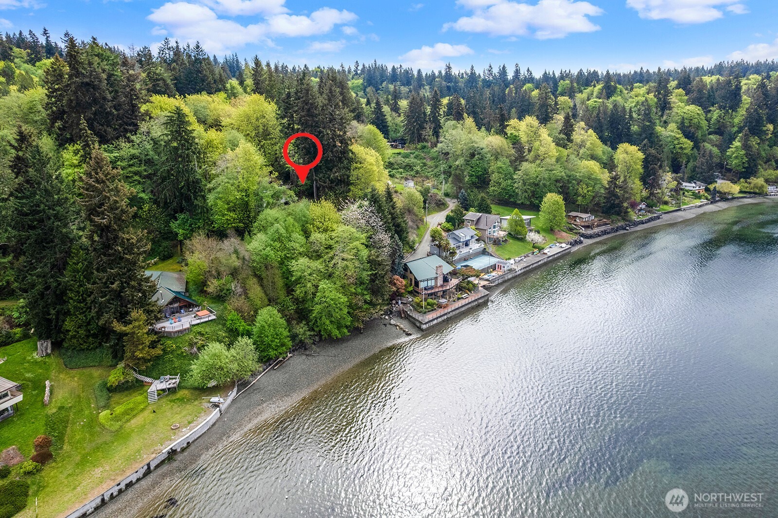 13843 Southwest 248th Street Vashon, WA 98070 - Photo 24 of 26 a view of a house with a yard and a pool