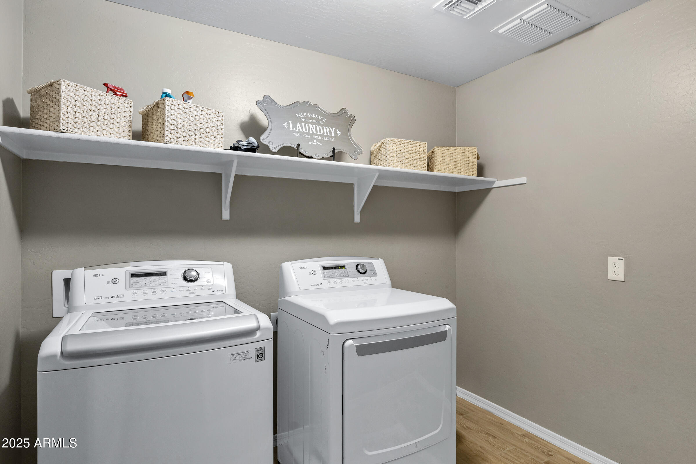 41311 West Elm Drive Maricopa, AZ 85138 - Photo 17 of 25 a utility room with dryer and washer