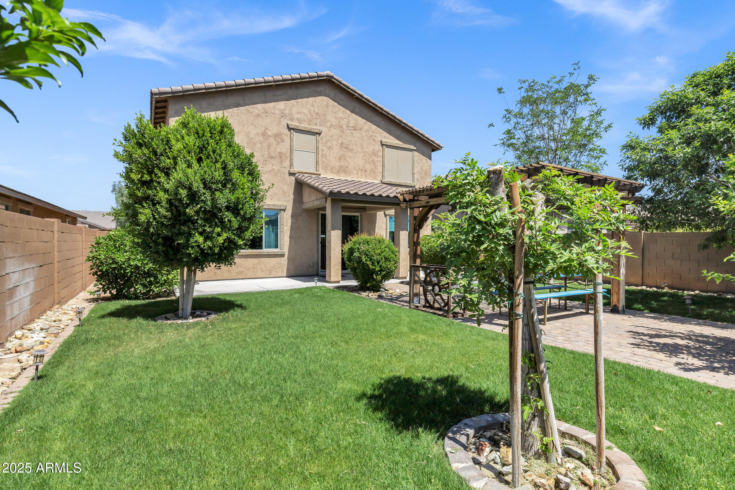 41311 West Elm Drive Maricopa, AZ 85138 - Photo 22 of 25 a front view of a house with a yard