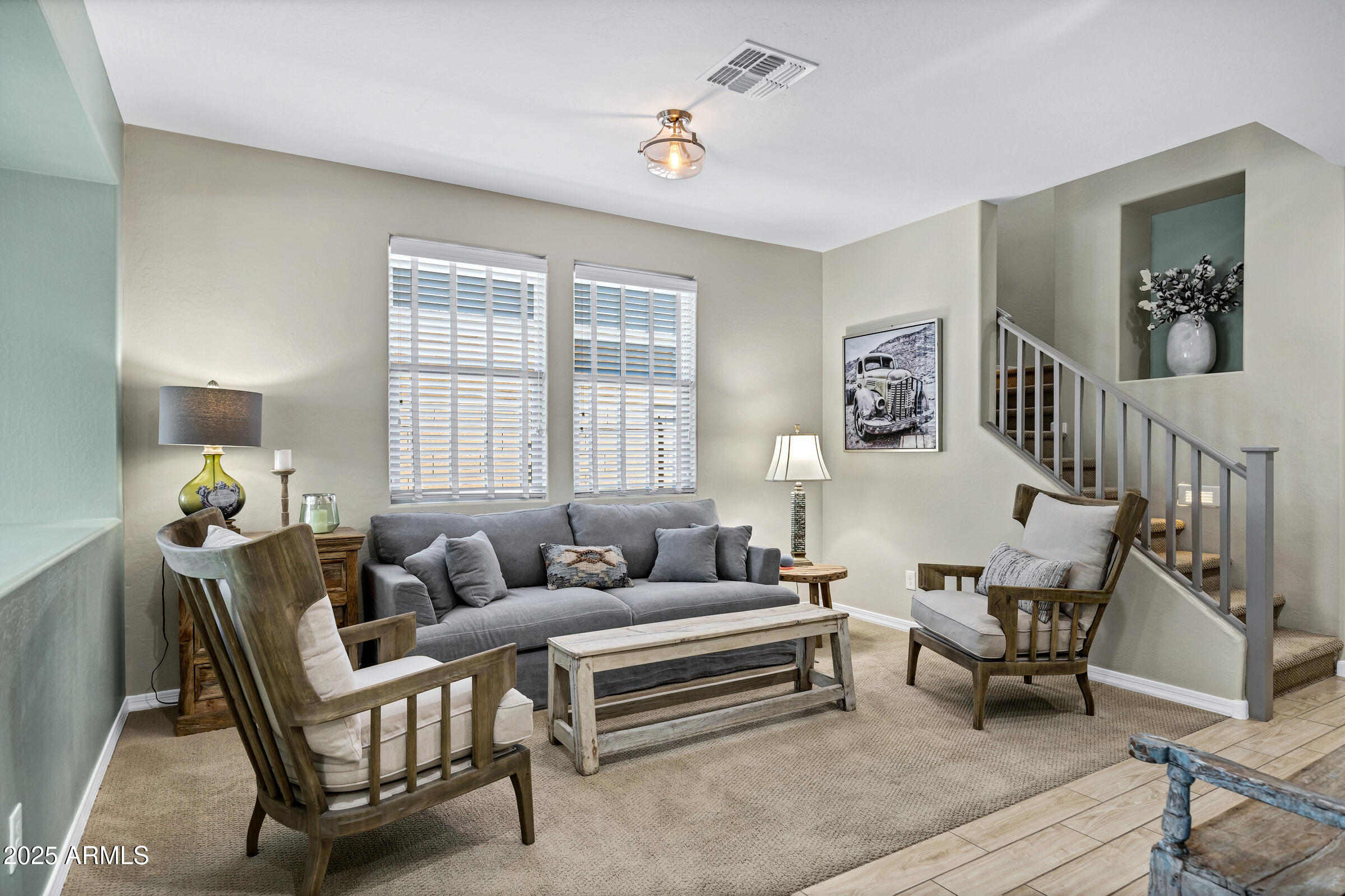 41311 West Elm Drive Maricopa, AZ 85138 - Photo 3 of 25 a living room with furniture and a window