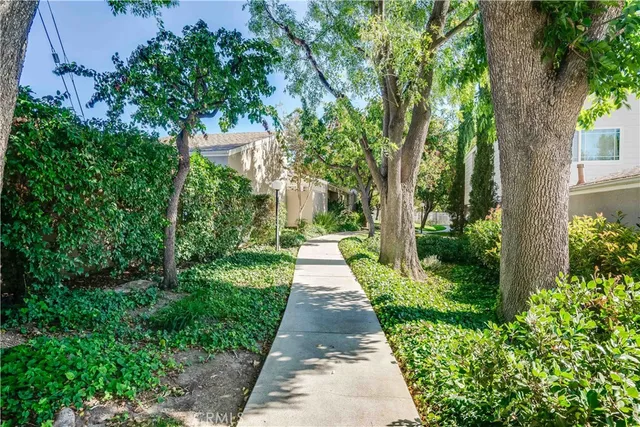 an entrance to the house with yard