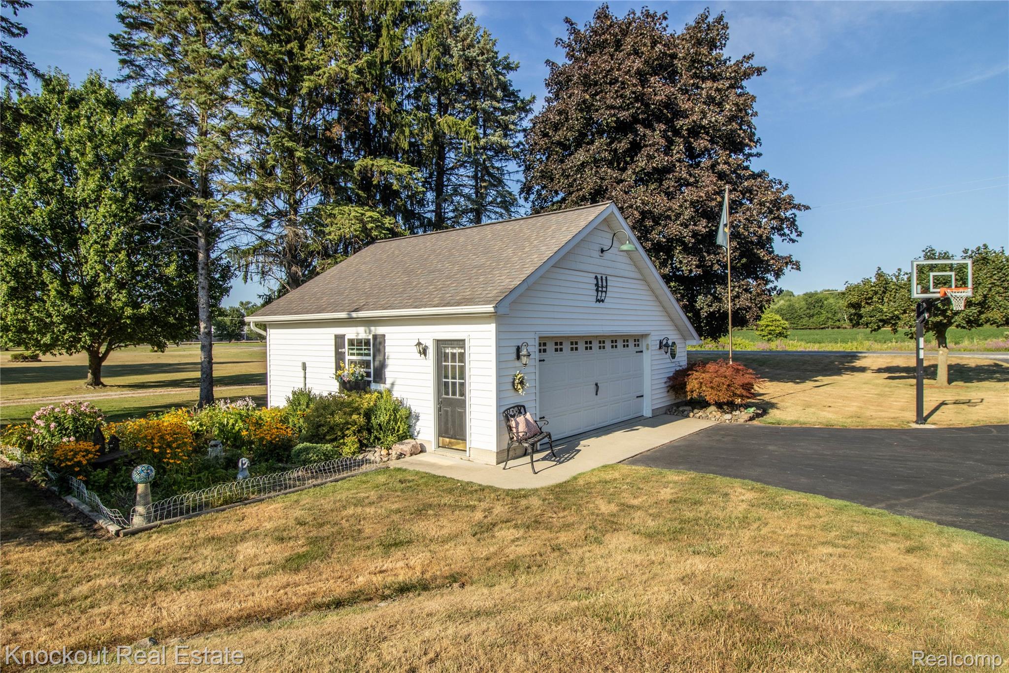 14720 Lincoln Road Chesaning, MI 48616 - Photo 54 of 60 Detached garage with a single vehicle door and side entry