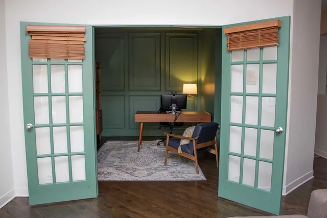 a room with furniture and lamp