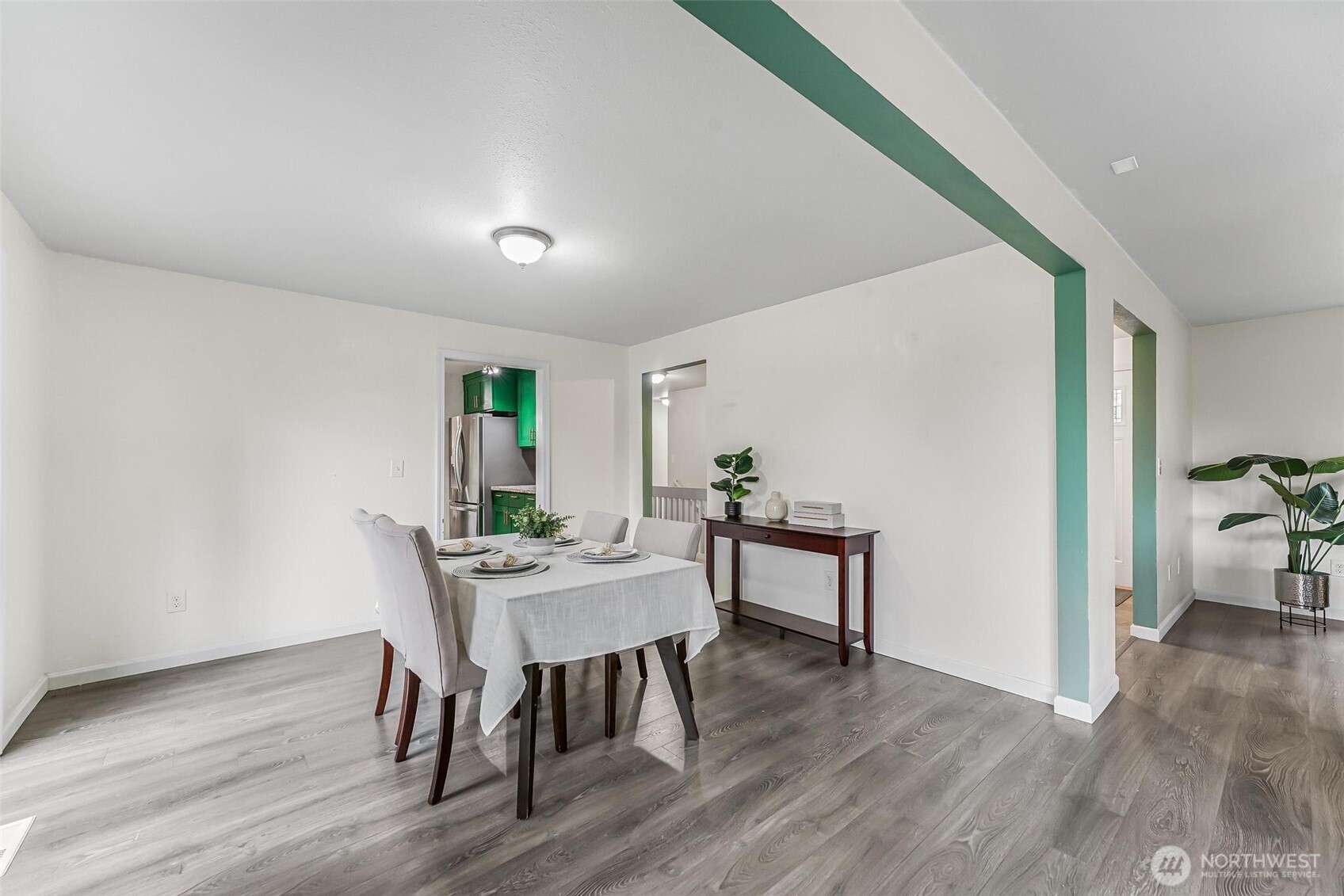11404 Karshner Road East Edgewood, WA 98372 - Photo 10 of 40 a view of a dining room with furniture and wooden floor