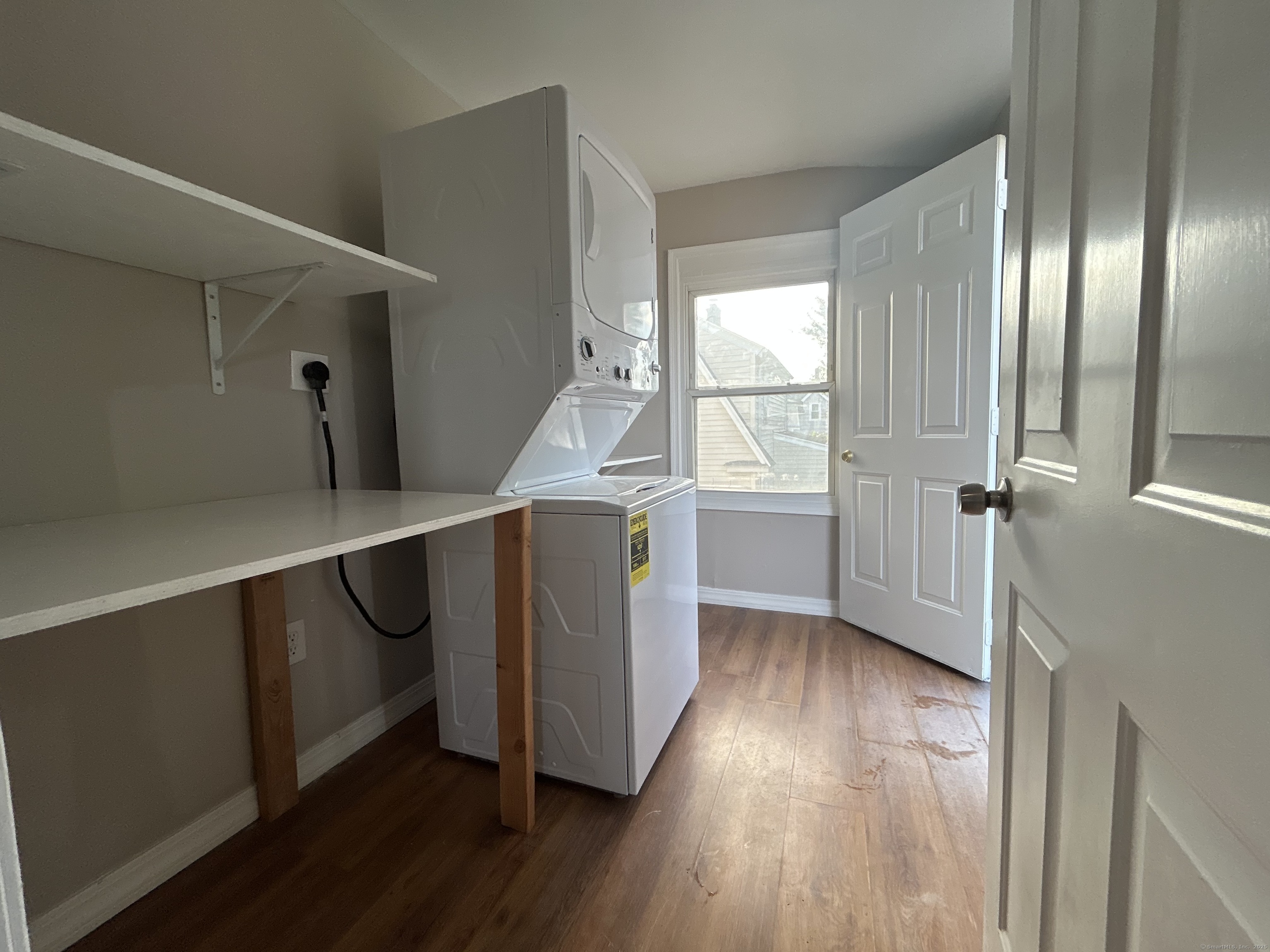 120 South End Road New Haven, CT 06512 - Photo 10 of 14 a hallway with wooden floors and cabinet