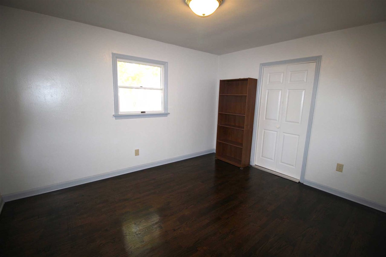 4622 Ottobine Road Dayton, VA 22821 - Photo 20 of 24 an empty room with wooden floor and windows