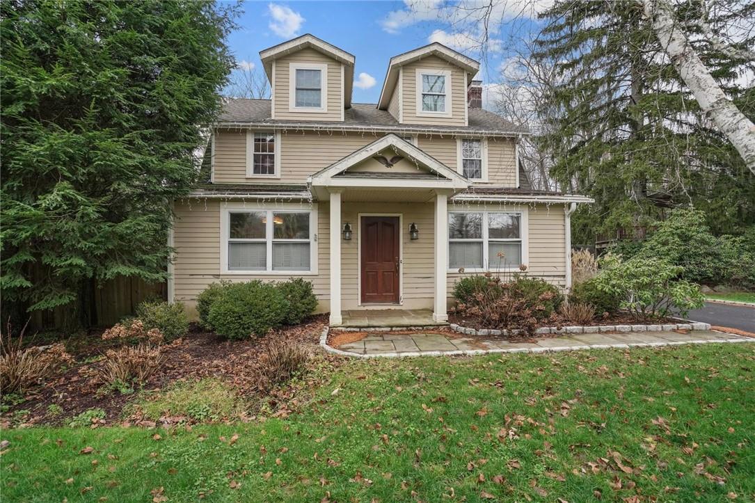 426 Smith Ridge Road South Salem, NY 10590 - Photo 1 of 1 a front view of a house with garden