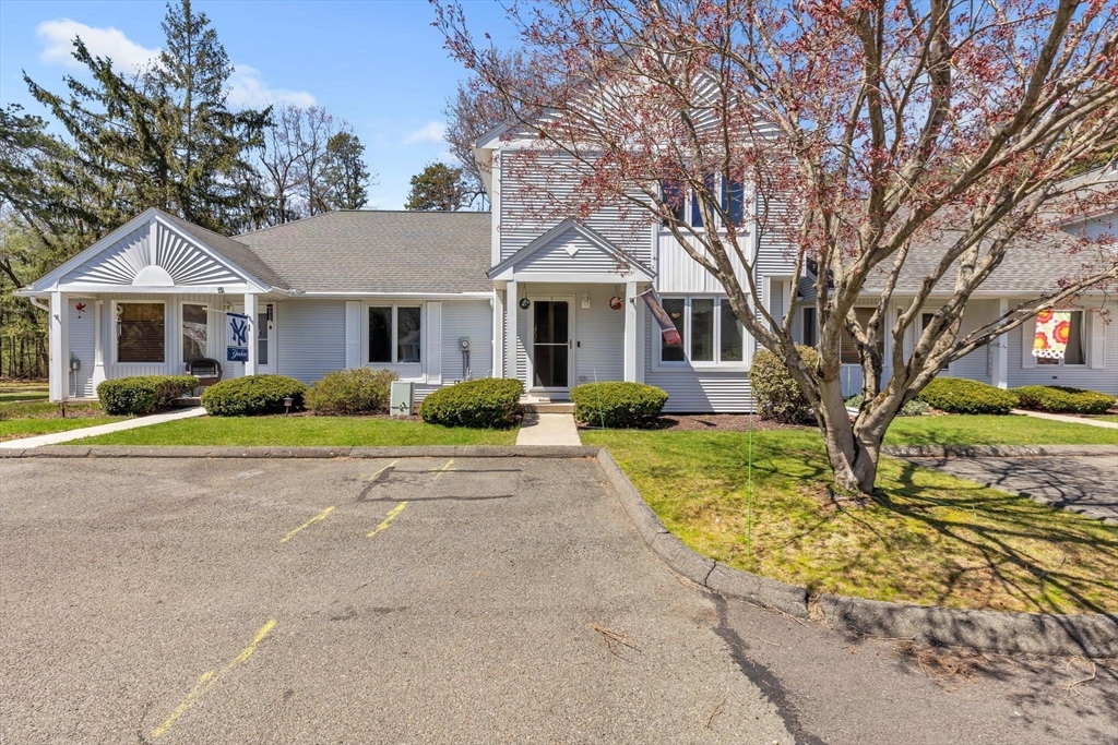 610 County Road, Unit 2 Holyoke, MA 01040 - Photo 1 of 42 a front view of house with yard and trees around