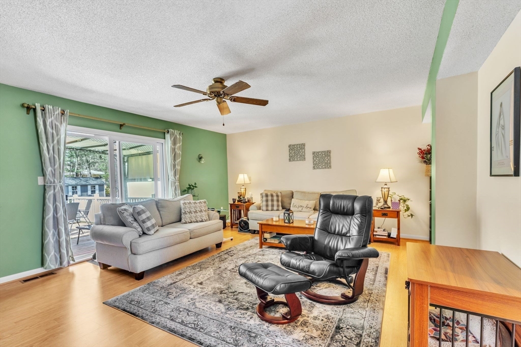 610 County Road, Unit 2 Holyoke, MA 01040 - Photo 12 of 42 a living room with furniture and wooden floor