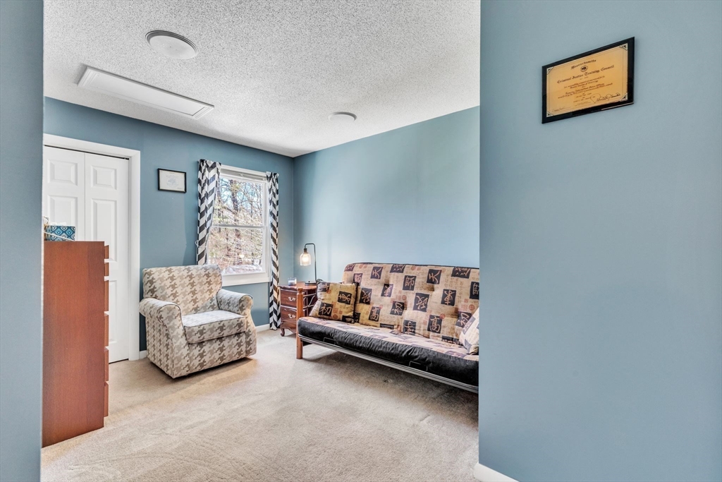 610 County Road, Unit 2 Holyoke, MA 01040 - Photo 23 of 42 a bedroom with furniture and a couch