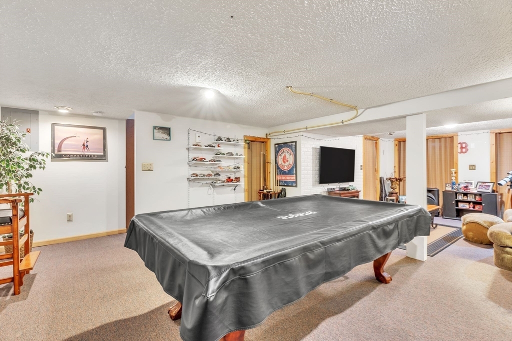 610 County Road, Unit 2 Holyoke, MA 01040 - Photo 28 of 42 a room with pool table and windows