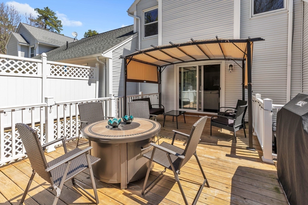 610 County Road, Unit 2 Holyoke, MA 01040 - Photo 33 of 42 a view of a patio with table and chairs