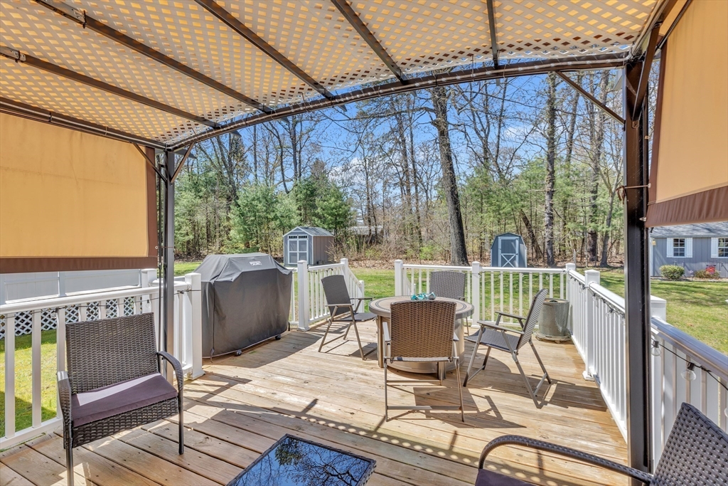 610 County Road, Unit 2 Holyoke, MA 01040 - Photo 35 of 42 a view of a patio with a table chairs and backyard