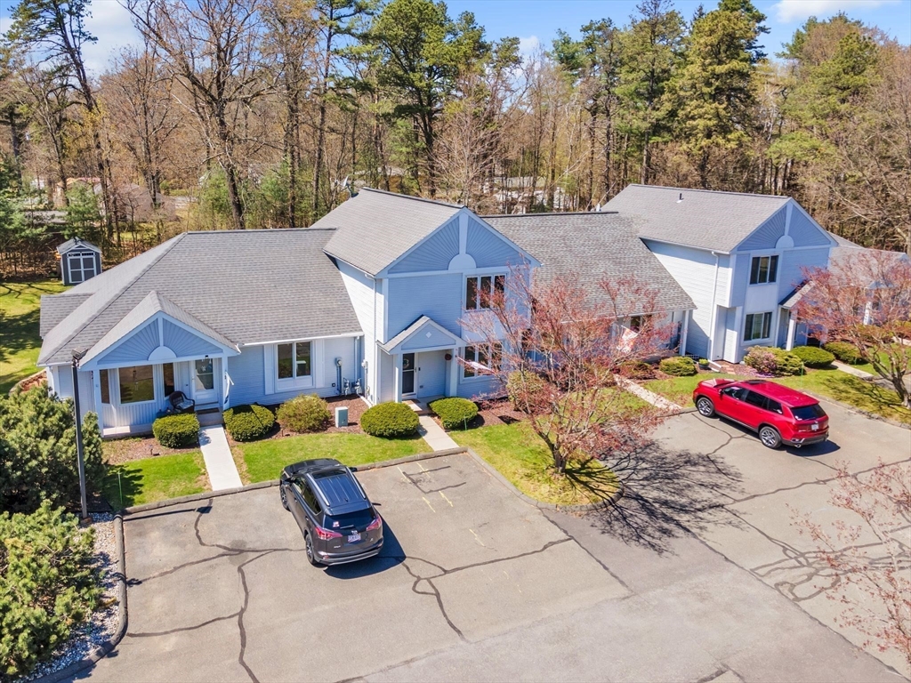 610 County Road, Unit 2 Holyoke, MA 01040 - Photo 39 of 42 a front view of a house with a yard garden and seating area