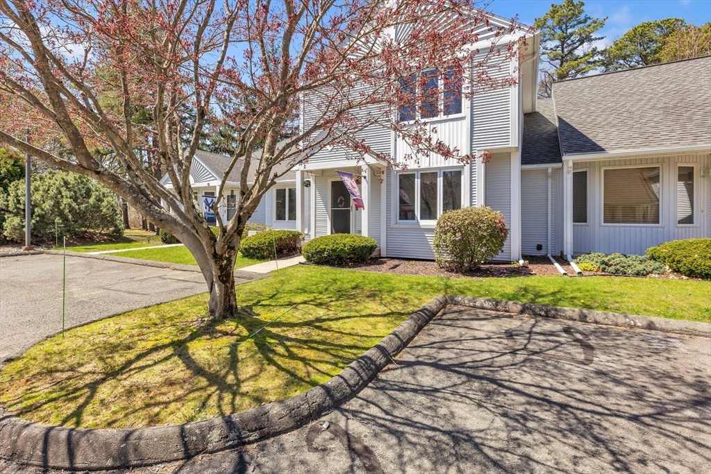 610 County Road, Unit 2 Holyoke, MA 01040 - Photo 4 of 42 a house with trees in front of it