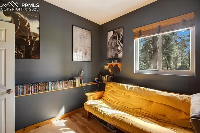 a workspace with furniture and a window