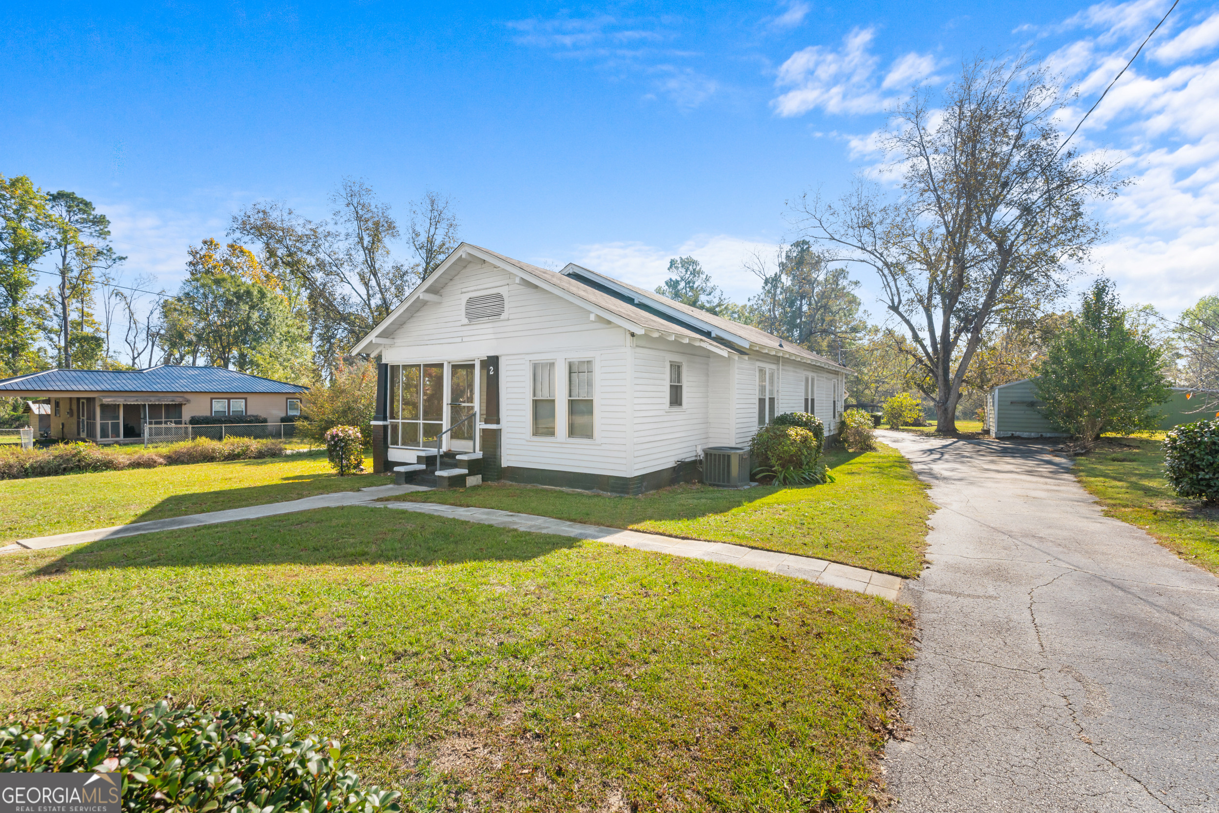 2 Finch Street Portal, GA 30450 - Photo 1 of 23 a view of a house with swimming pool and a yard