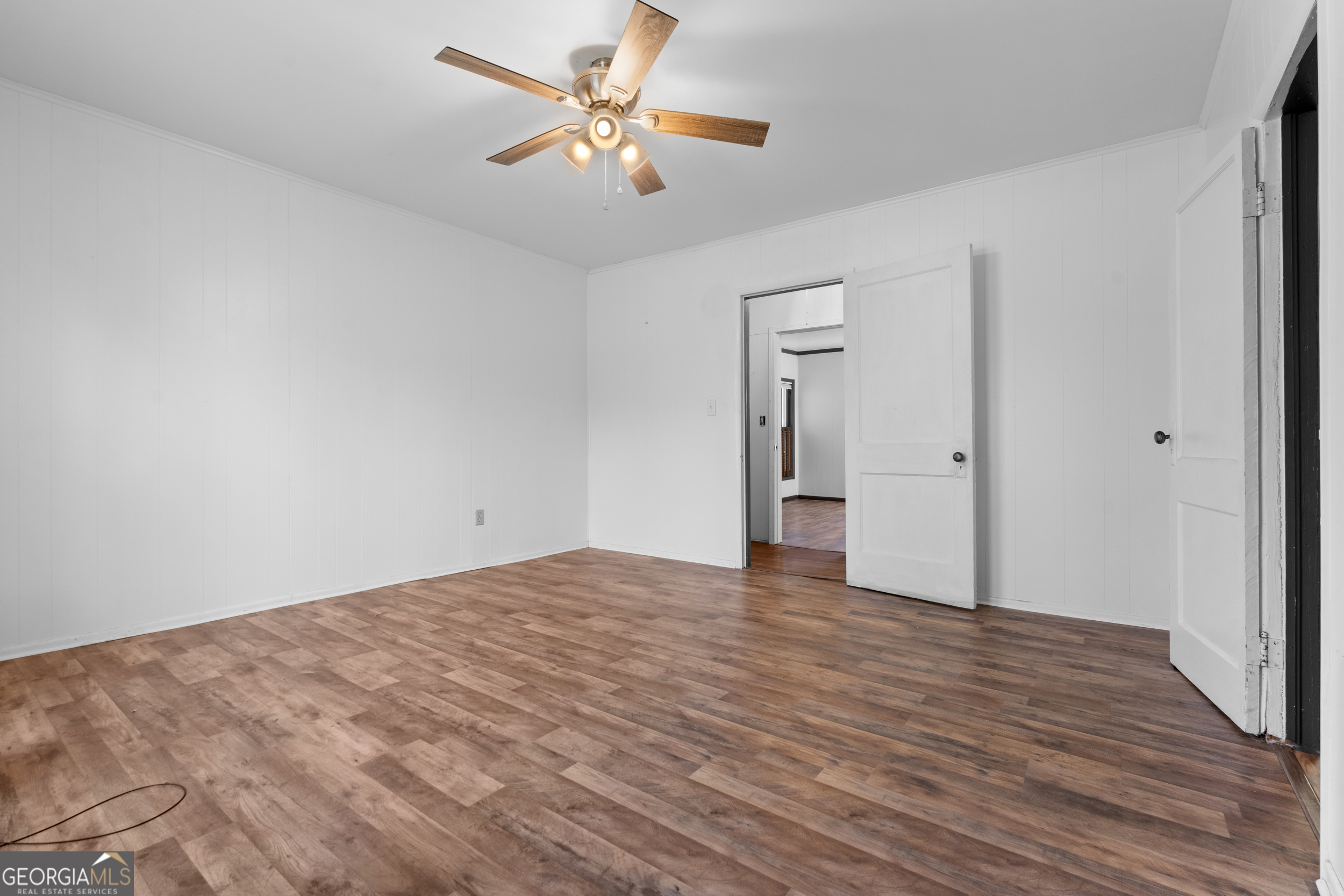2 Finch Street Portal, GA 30450 - Photo 13 of 23 a view of an empty room and wooden floor