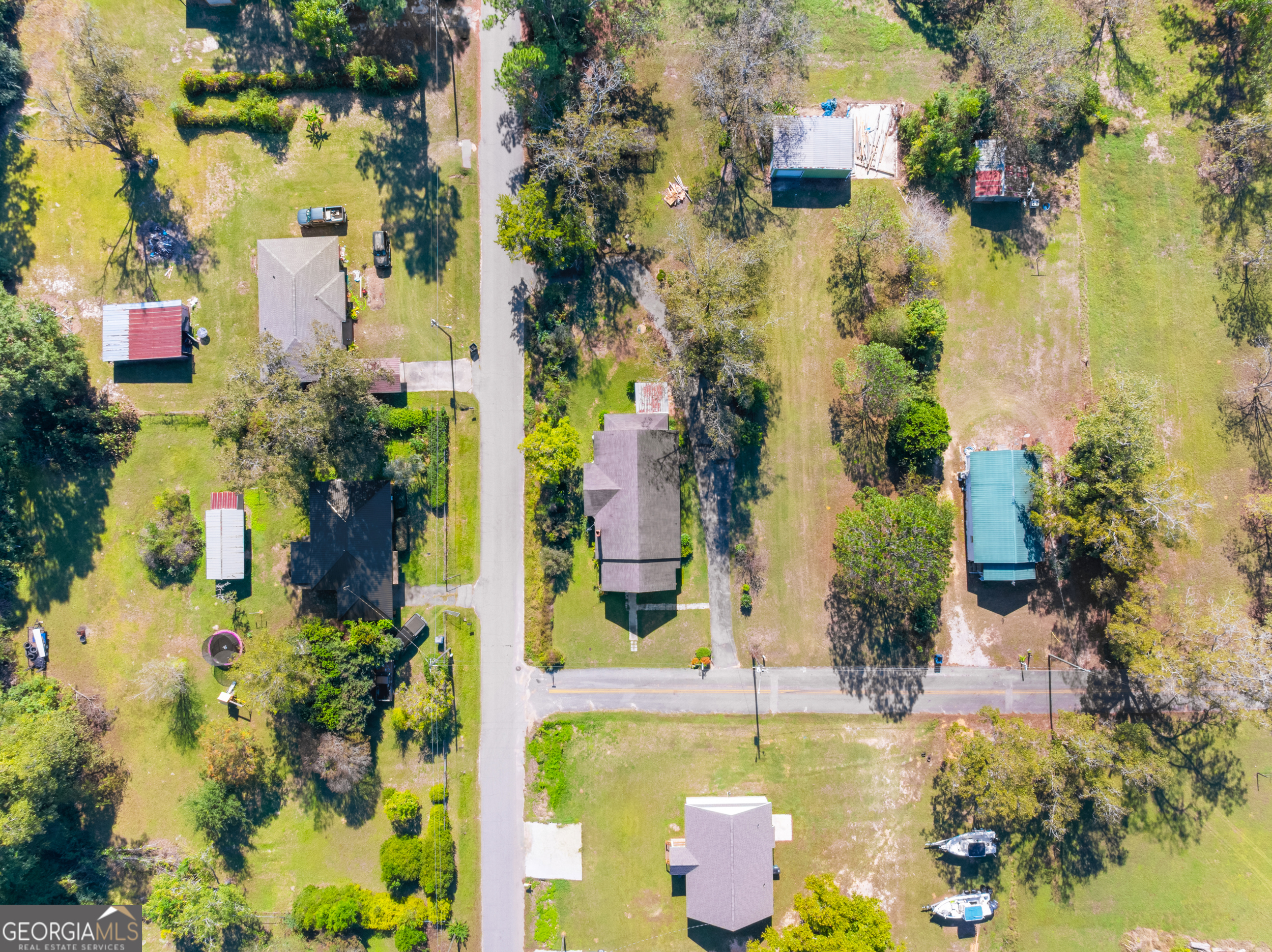 2 Finch Street Portal, GA 30450 - Photo 18 of 23 aerial view of a house with a yard and swimming pool