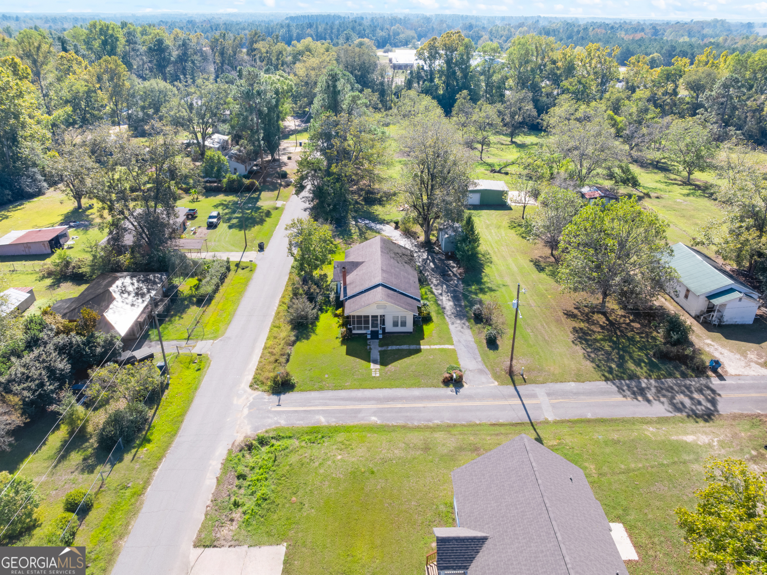 2 Finch Street Portal, GA 30450 - Photo 2 of 23 a view of an swimming pool yard and outdoor seating