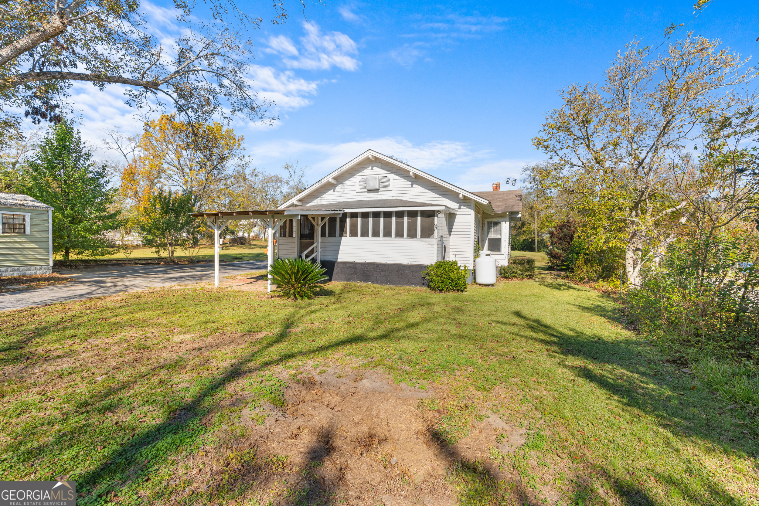 2 Finch Street Portal, GA 30450 - Photo 22 of 23 a front view of a house with a yard