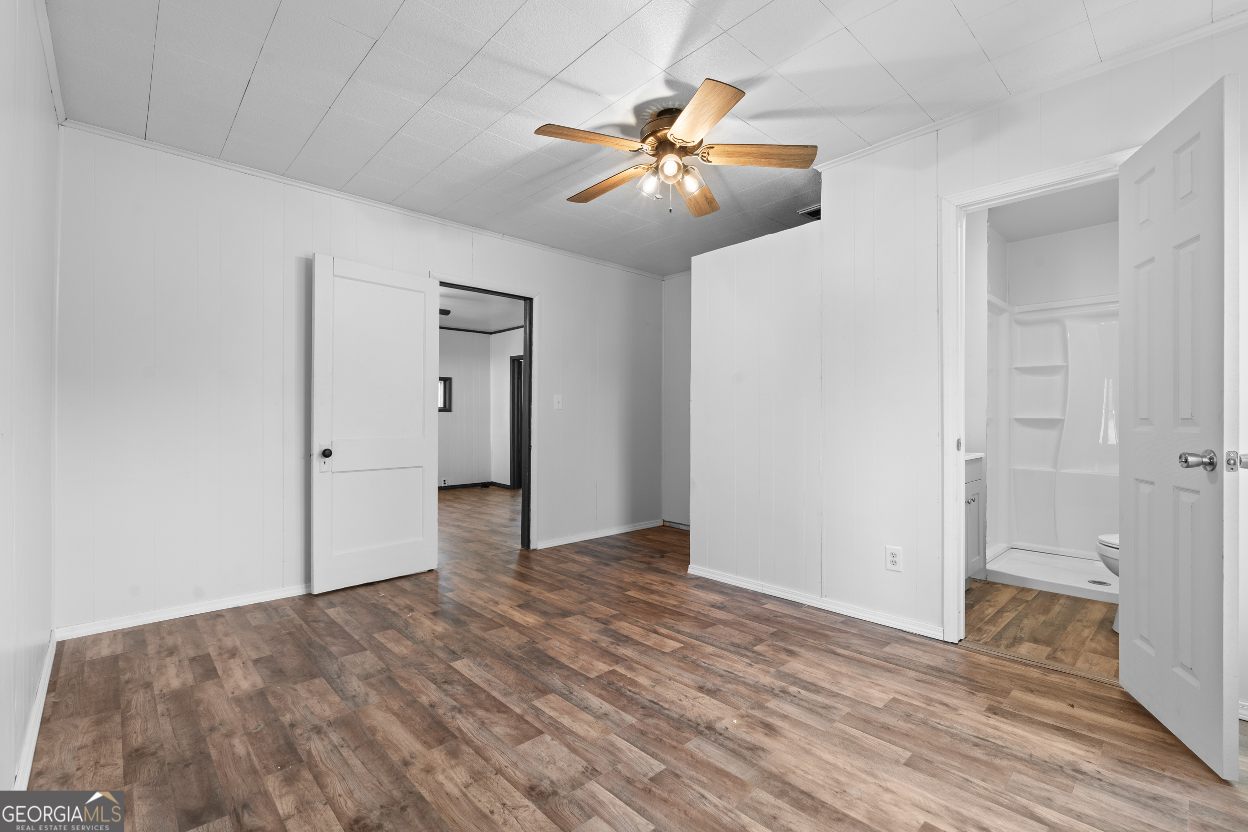 2 Finch Street Portal, GA 30450 - Photo 9 of 23 a view of an empty room with wooden floor