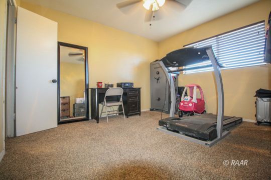 632 South Nevada Street Ridgecrest, CA 93555 - Photo 20 of 29 a view of a room with gym equipment