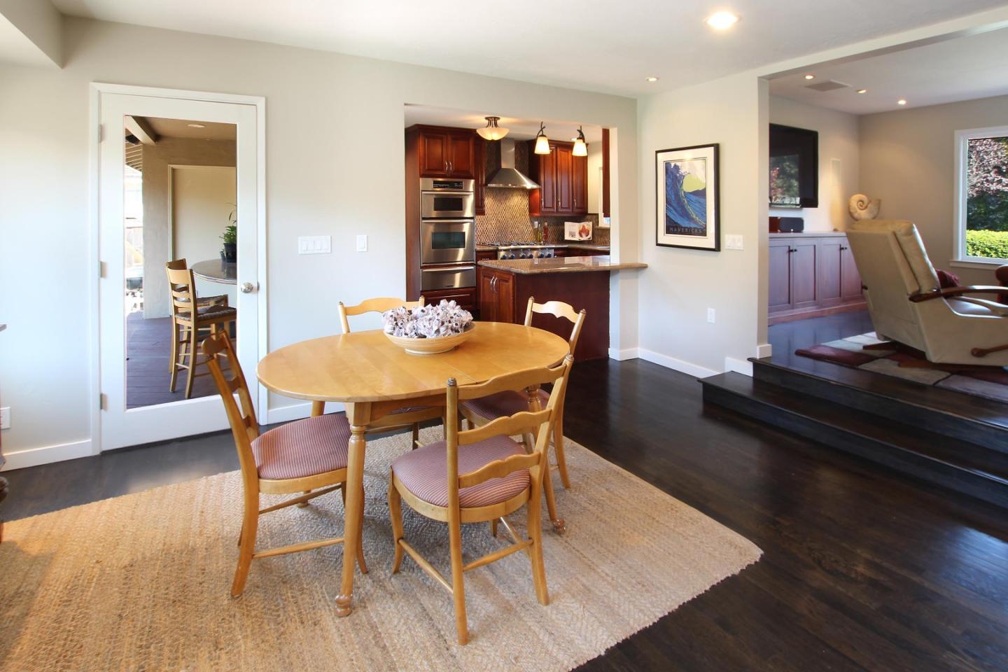 11 Oak Road Santa Cruz, CA 95060 - Photo 17 of 57 a dining room with furniture and wooden floor
