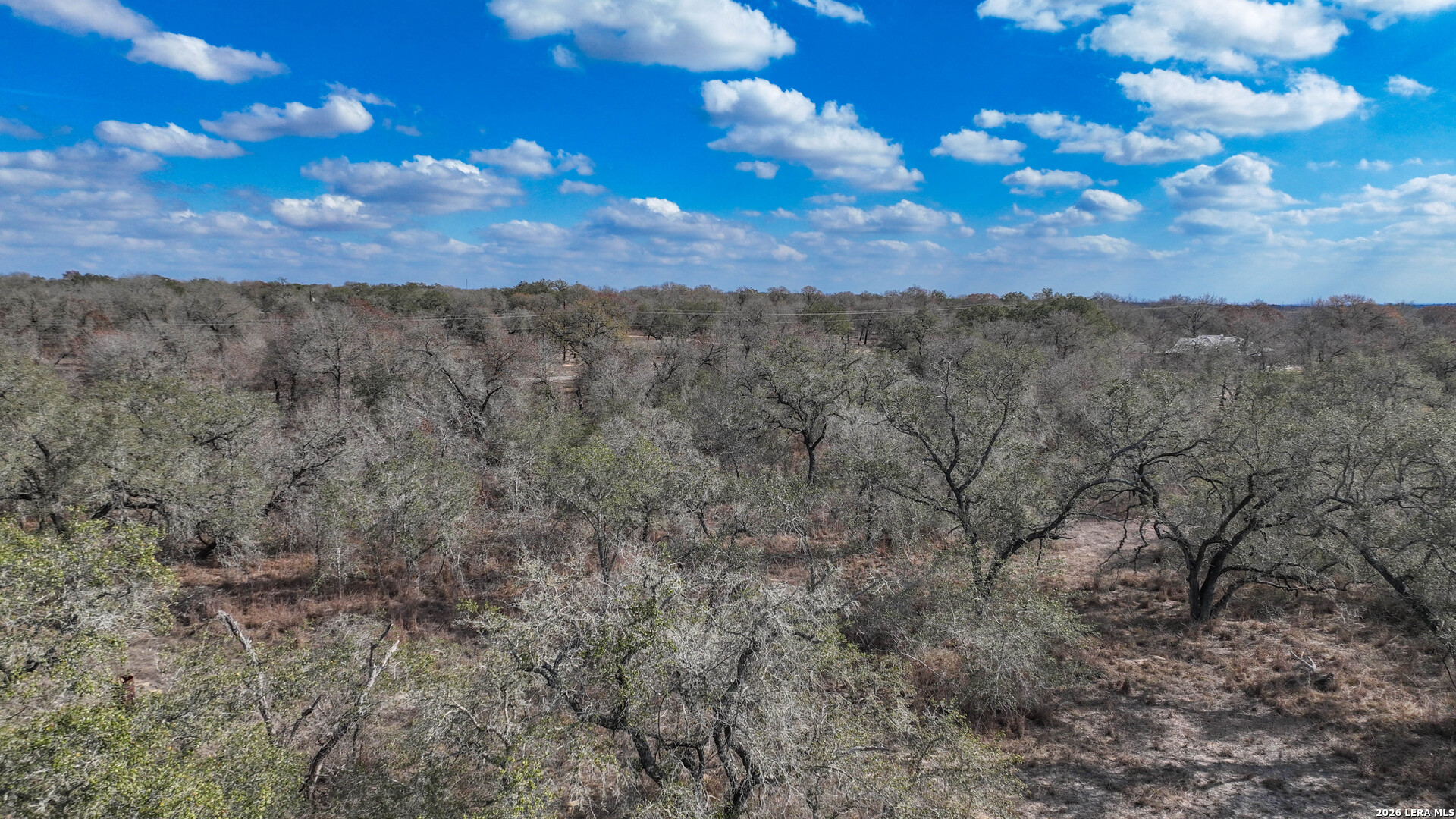 20 Clear Lake Loop Poteet, TX 78065 - Photo 7 of 13 a view of sunset