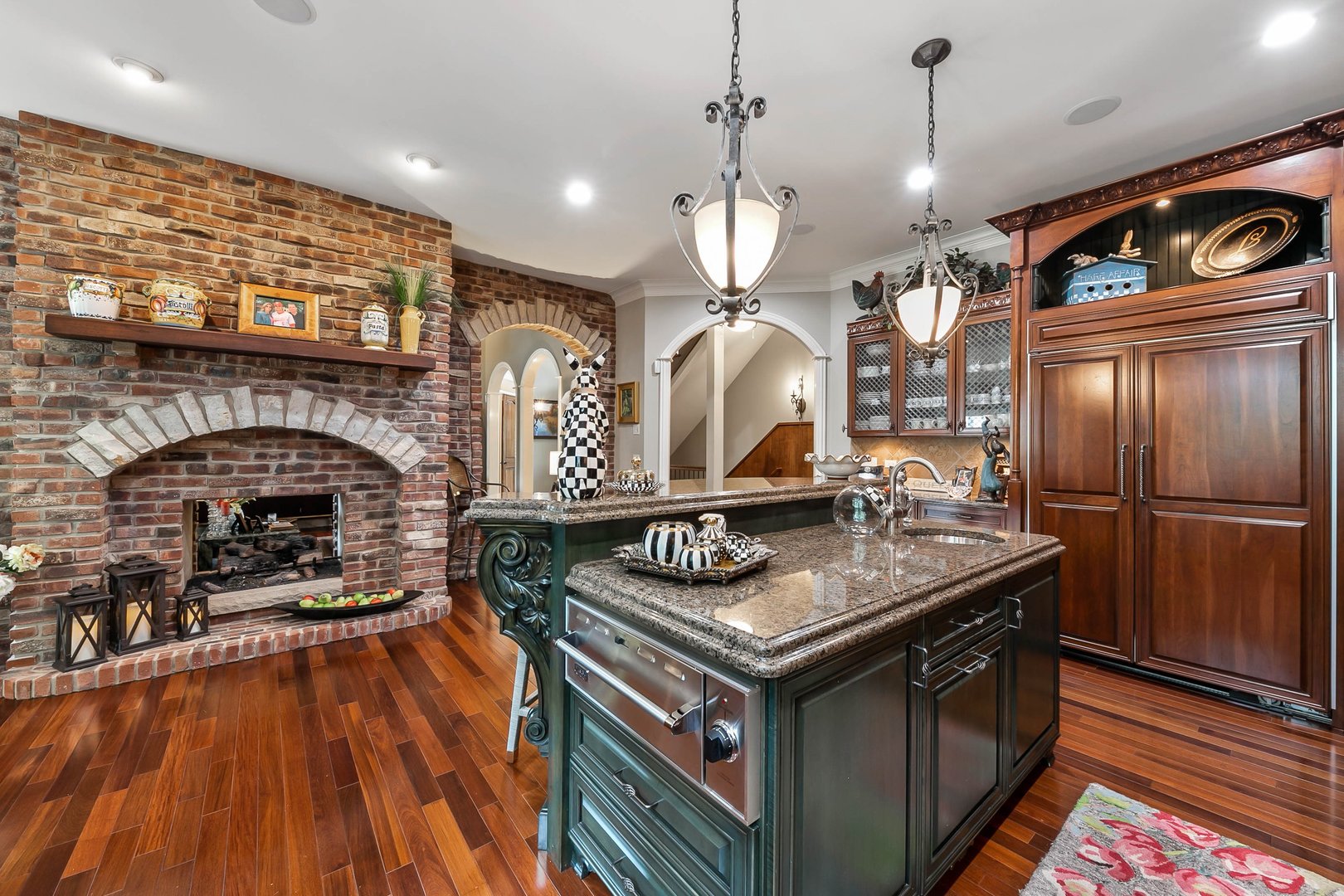 992 Sylvan Circle Naperville, IL 60540 - Photo 7 of 36 a kitchen with stainless steel appliances granite countertop a stove and a wooden floors
