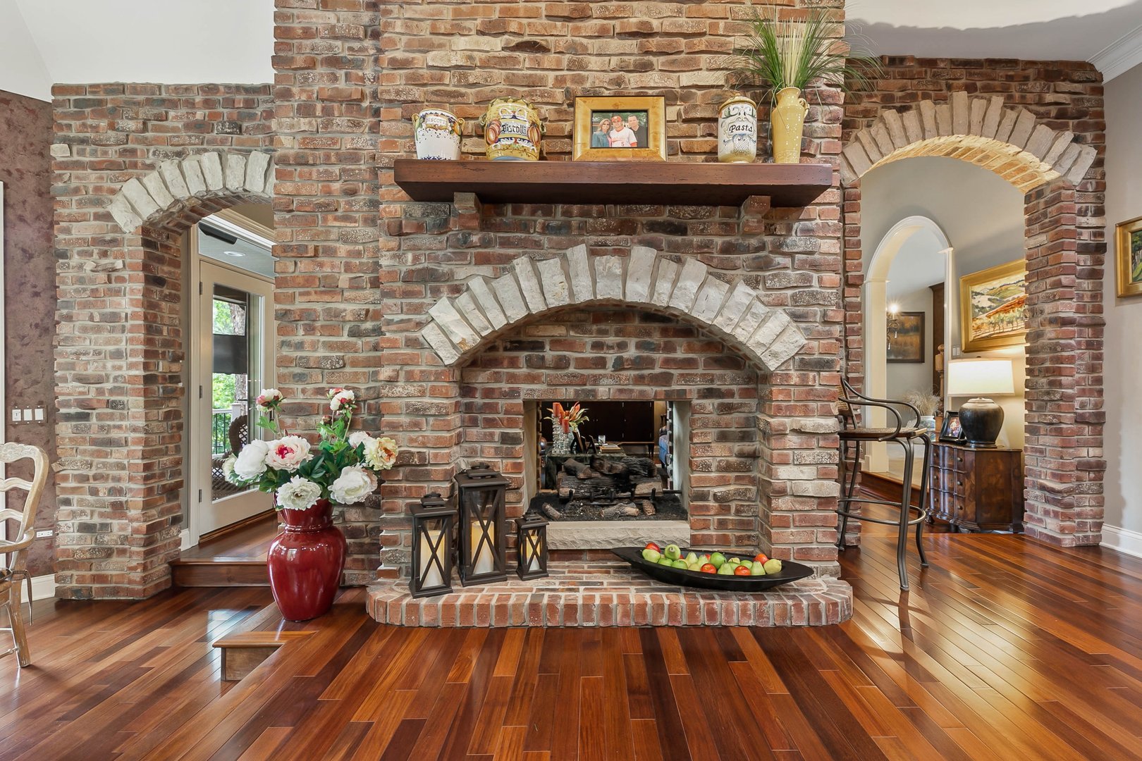 992 Sylvan Circle Naperville, IL 60540 - Photo 10 of 36 a living room with fireplace furniture and wooden floor