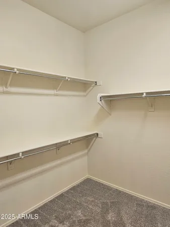 a bathroom with a double vanity sink and mirror
