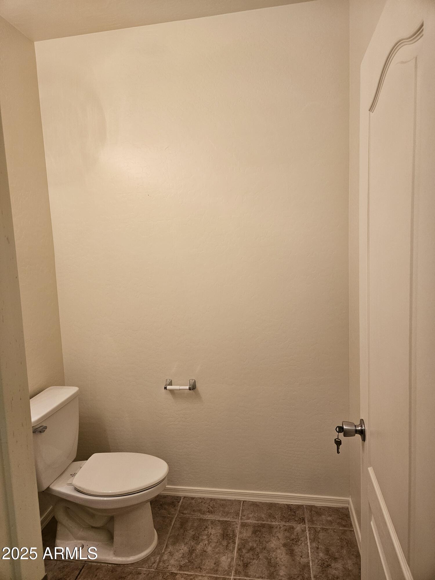 4692 South Calico Road Gilbert, AZ 85297 - Photo 24 of 29 a bathroom with a toilet and a shower