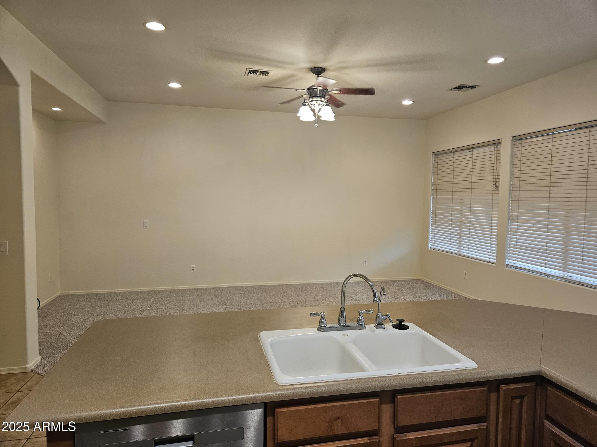 4692 South Calico Road Gilbert, AZ 85297 - Photo 4 of 29 a bathroom with a sink and a window