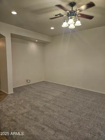 a view of a room with a fan