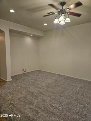 a view of a room with a fan