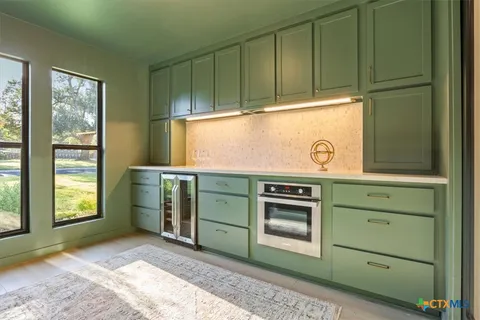 a view of livingroom with furniture and window
