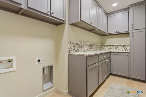 a view of a patio with furniture