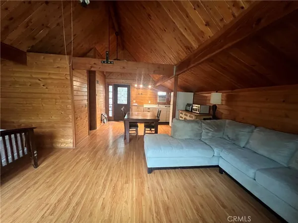 a view of a patio with wooden floor