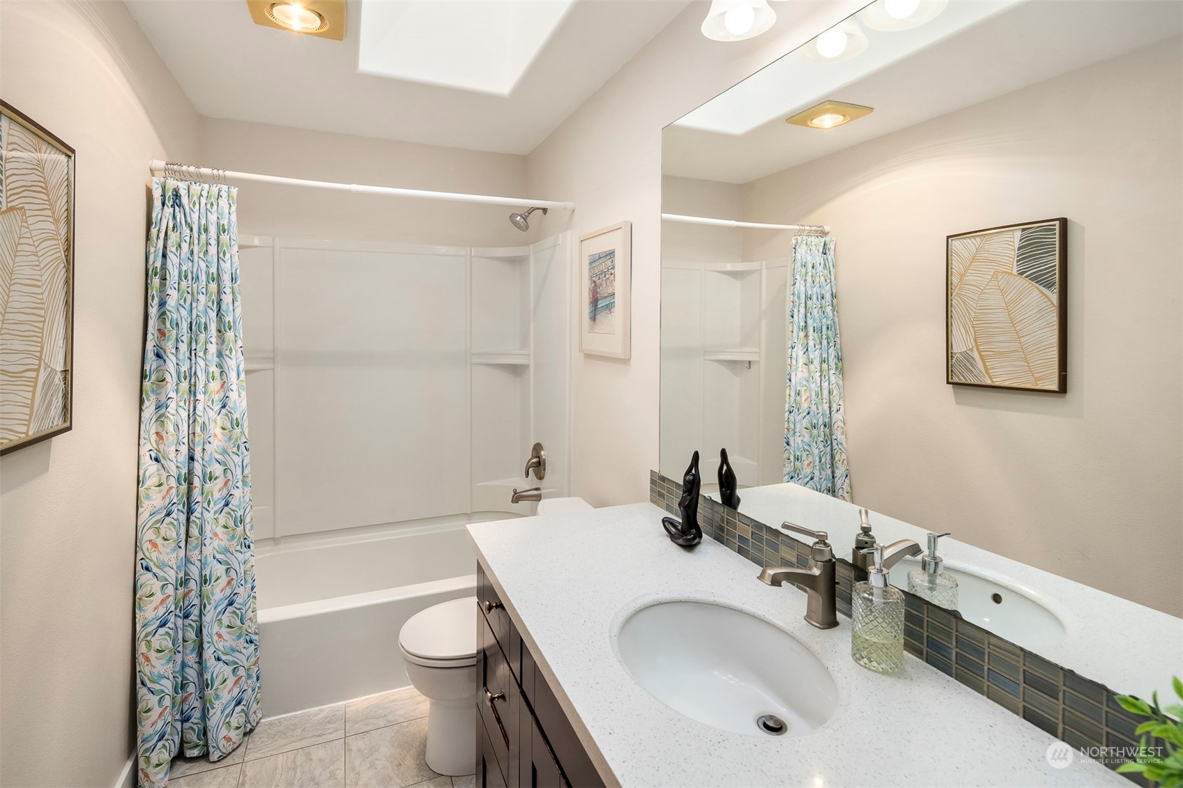 1601 Field Avenue Northeast Renton, WA 98059 - Photo 17 of 36 a bathroom with a sink a toilet and shower