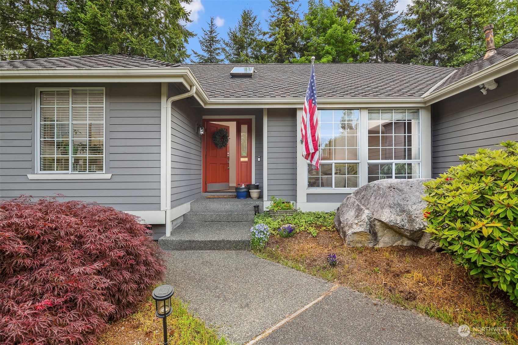 1601 Field Avenue Northeast Renton, WA 98059 - Photo 3 of 36 a front view of a house with garden