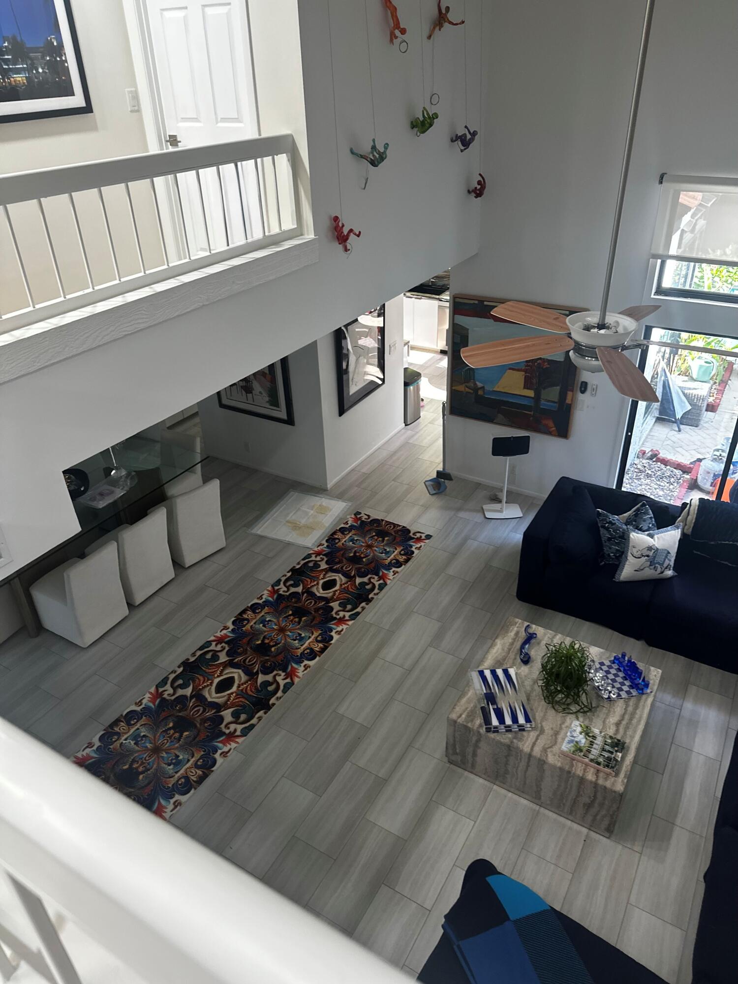 7362 Woodmont Court Boca Raton, FL 33434 - Photo 2 of 14 living room and dining room from second
